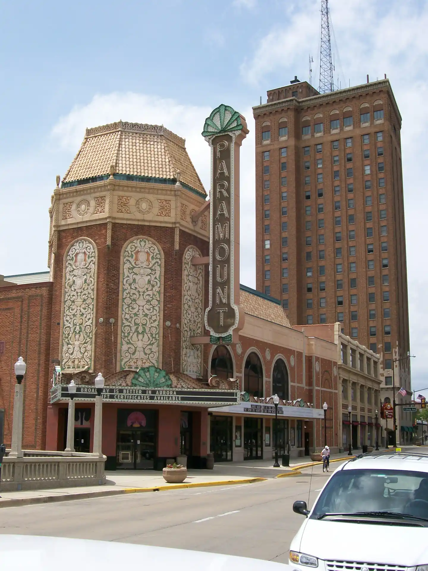 Downtown Aurora, Illinois street view showing the Paramount Theatre, historic Leland Tower, and former Carson's building on Galena Boulevard
