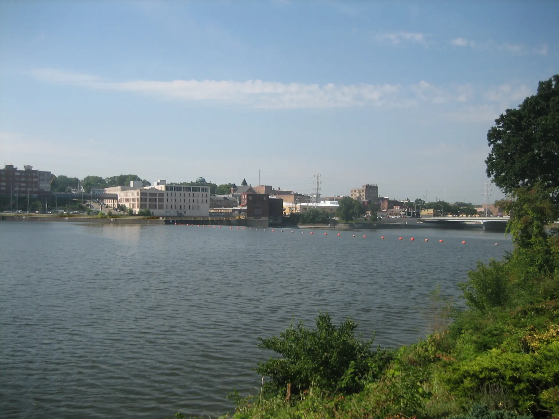 Rock River flowing through Dixon, Illinois with city skyline in background