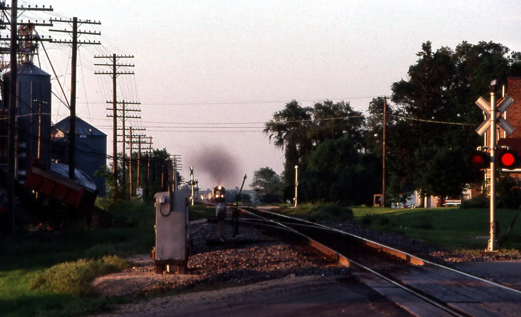 BNSF freight train passing through Sugar Grove, IL on the Chicago mainline, 1996