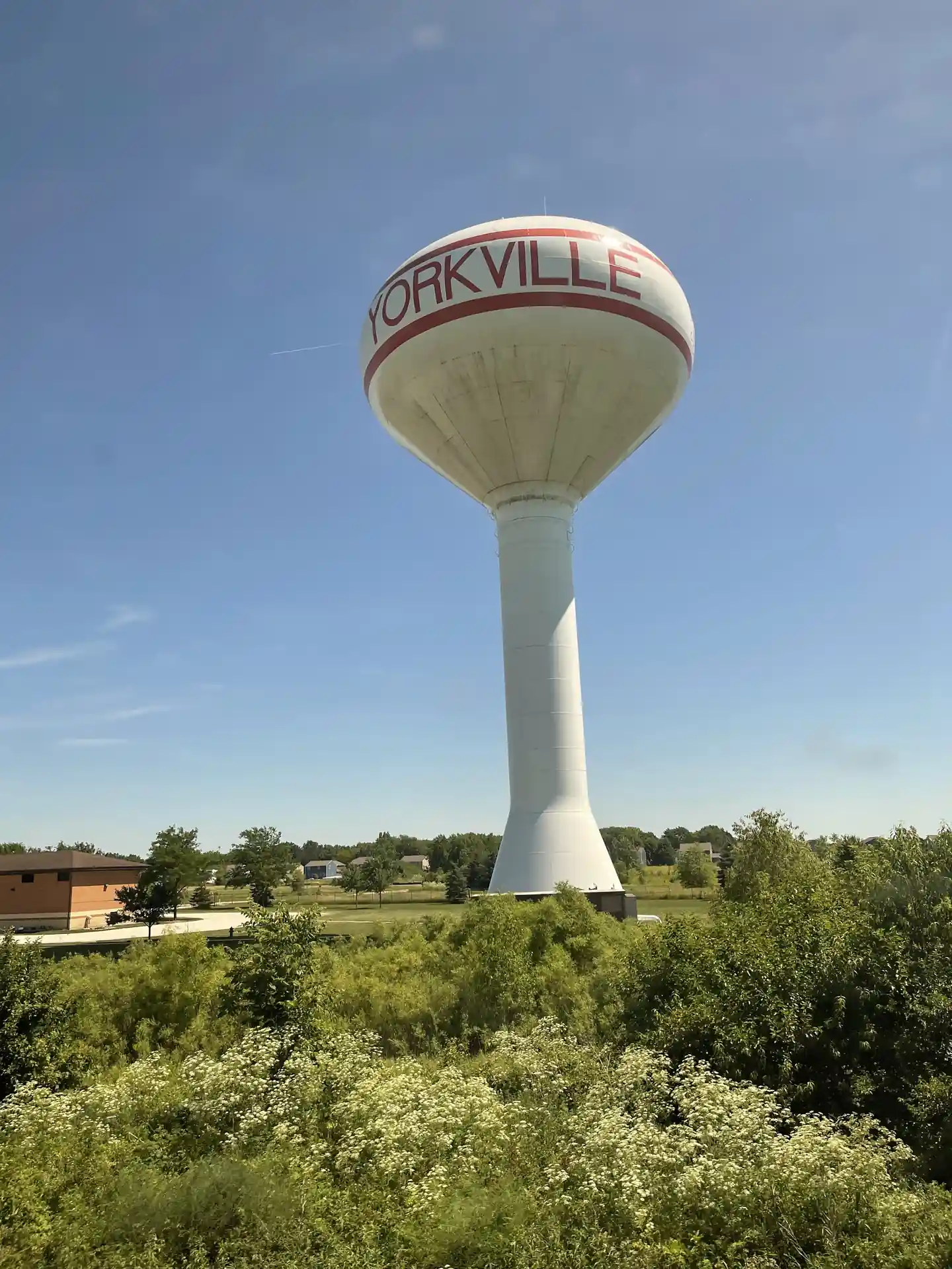 Yorkville, Illinois water tower as seen from the passing California Zephyr train, June 2022