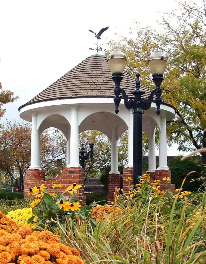 Village gazebo surrounded by fall foliage in Barrington, Illinois